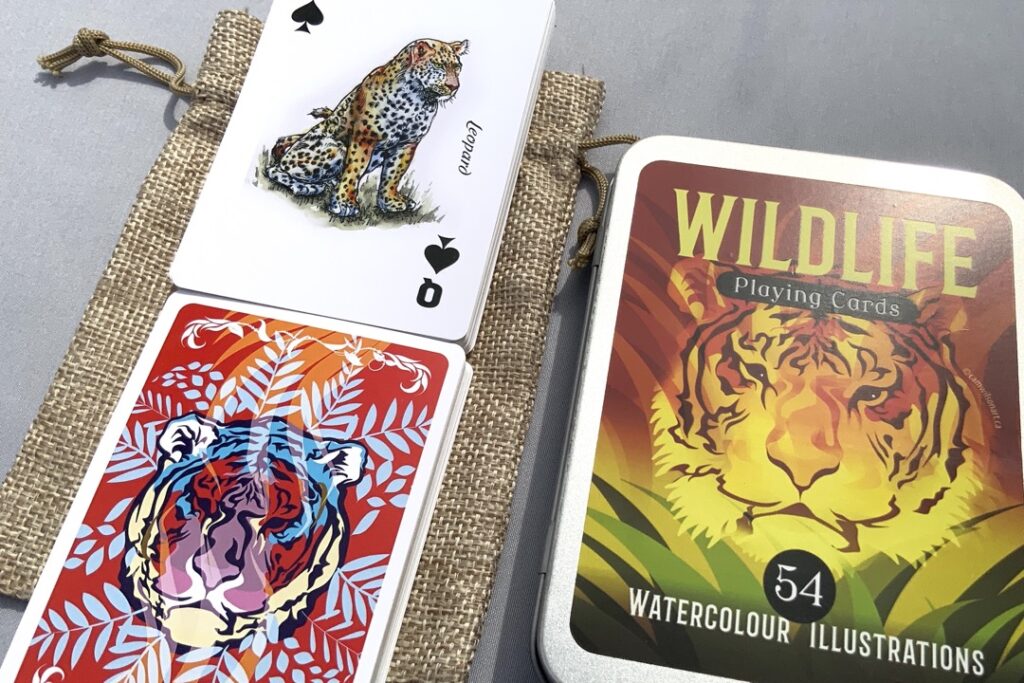 watercolor illustration of a leopard on the queen of spades